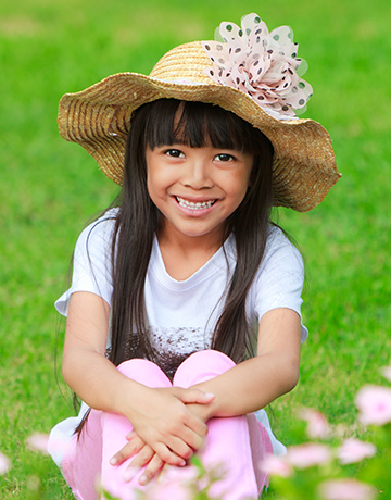 Girl wearing straw hat